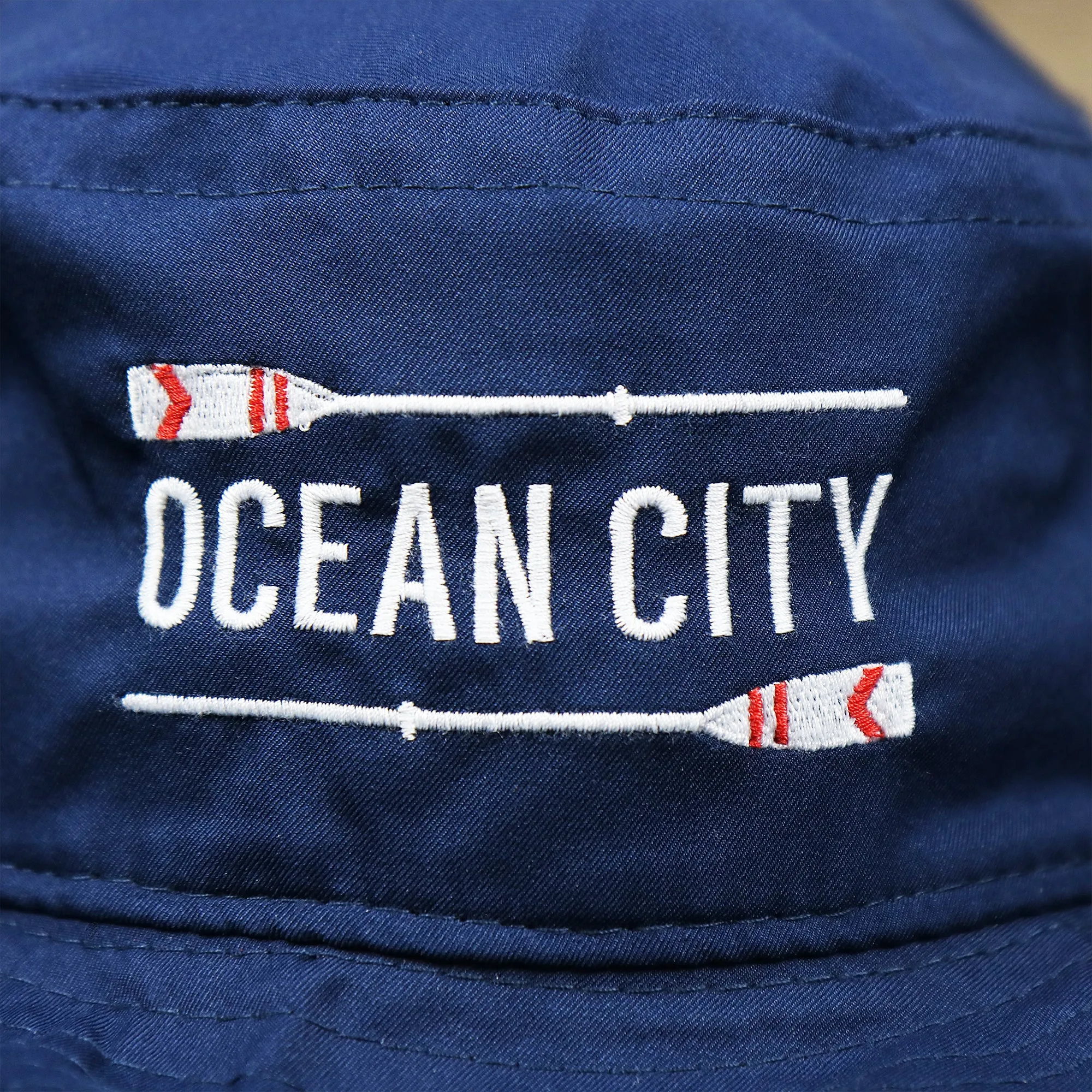 Ocean City Wordmark Parallel Oars New Jersey Bucket Hat | Navy Blue Bucket Hat