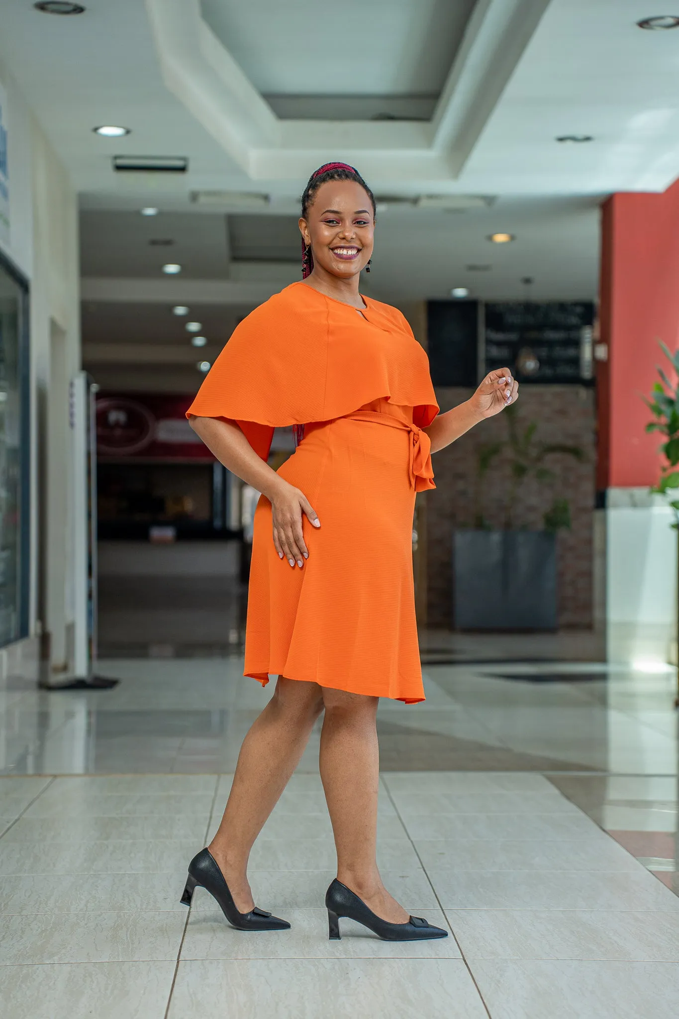 Tangerine cape belt dress